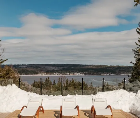 chairs in front of lake