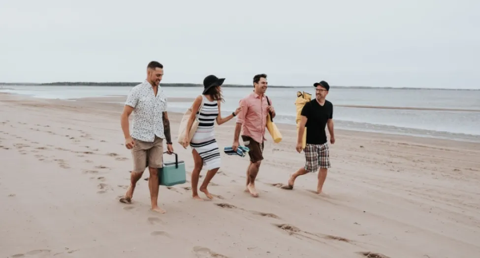 four people on the beach