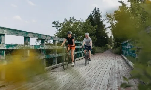 two people cycling